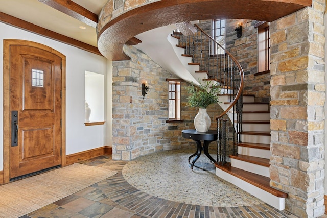 12535 Beach Cir, Eden Prairie, MN 55344 - foyer entrance with stairway, baseboards, stone tile flooring, and a healthy amount of sunlight