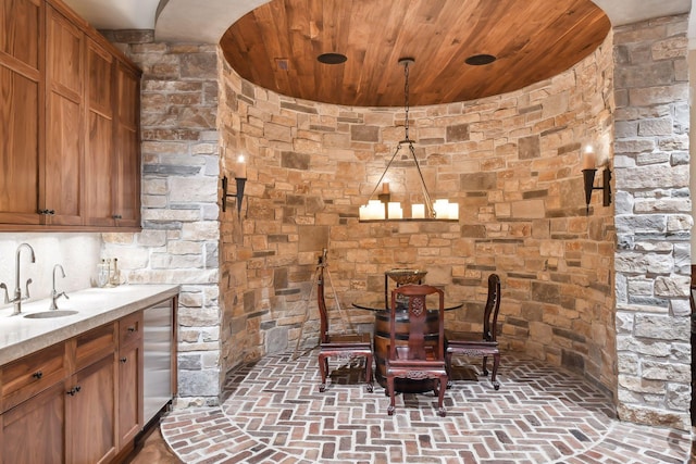 12535 Beach Cir, Eden Prairie, MN 55344 - dining room featuring brick floor and wooden ceiling