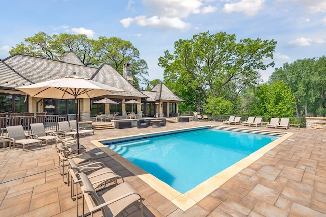 12535 Beach Cir, Eden Prairie, MN 55344 - community pool with a patio area and fence