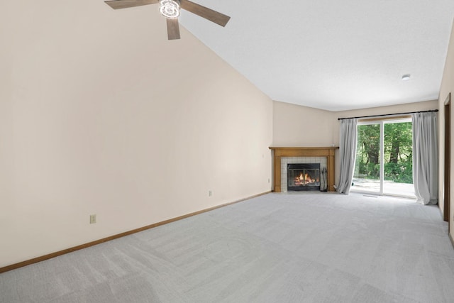 2672 Lake Court Dr Unit 58, Mounds View, MN 55112 - unfurnished living room with carpet, a tile fireplace, baseboards, and a ceiling fan
