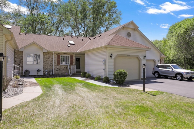 2672 Lake Court Dr Unit 58, Mounds View, MN 55112 - single story home with a garage, a shingled roof, a front lawn, and concrete driveway