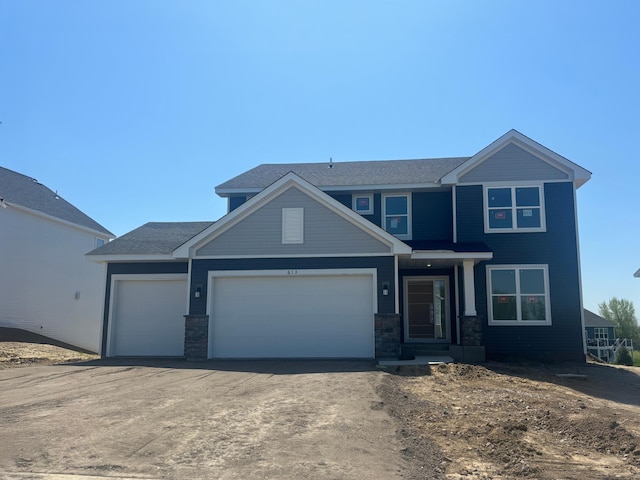 613 Rolling Hills Ln, Delano, MN 55328 - view of front of home featuring a garage and concrete driveway