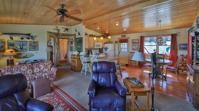 living area featuring wooden ceiling, ceiling fan, lofted ceiling, and light colored carpet