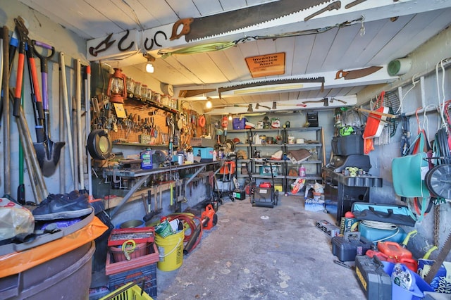 garage with a workshop area