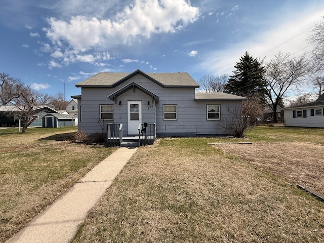 128 Munsterman St, Appleton, MN 56208 - bungalow-style home featuring a front yard