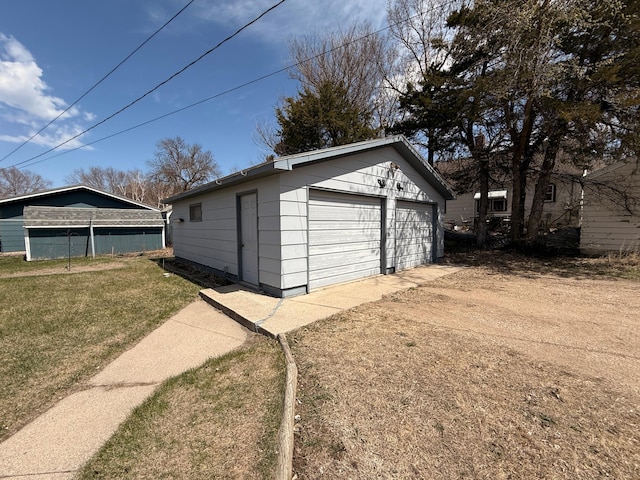 128 Munsterman St, Appleton, MN 56208 - detached garage featuring fence