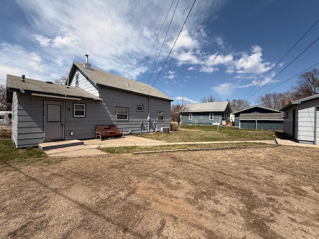 128 Munsterman St, Appleton, MN 56208 - view of rear view of property