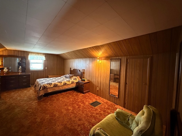 128 Munsterman St, Appleton, MN 56208 - bedroom with wooden walls, carpet, and lofted ceiling