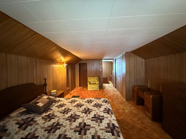 128 Munsterman St, Appleton, MN 56208 - carpeted bedroom with lofted ceiling and wood walls