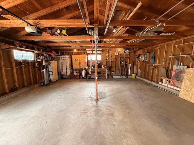 128 Munsterman St, Appleton, MN 56208 - garage featuring a garage door opener