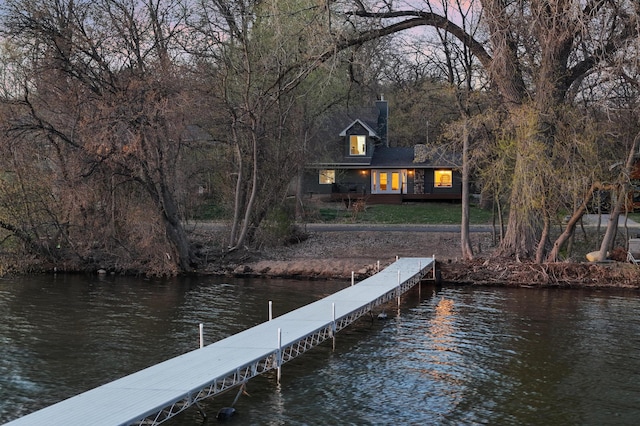 view of dock with a water view