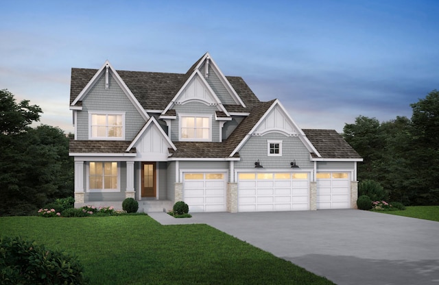 view of front of house with stone siding, driveway, and a front yard