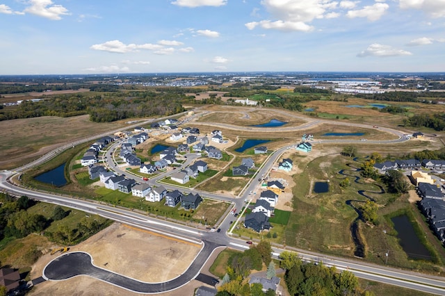aerial view featuring a water view and a residential view