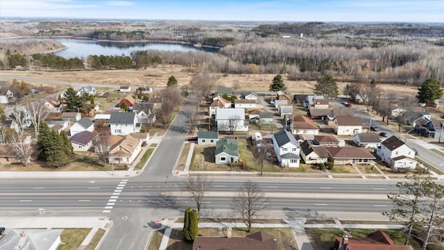 aerial view with a residential view and a water view