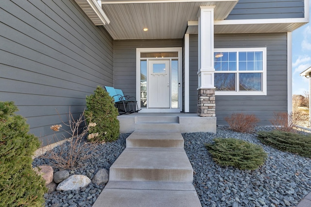 property entrance featuring covered porch