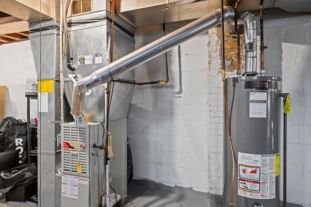 utility room featuring gas water heater