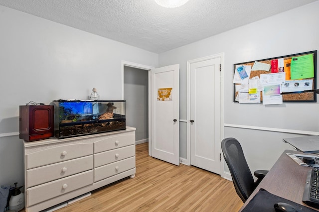 46324634 Cedar Ave S, Minneapolis, MN 55407 - office with a textured ceiling and light wood finished floors