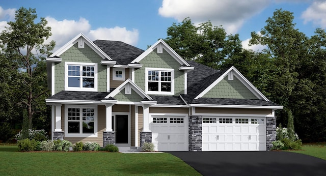 craftsman house featuring driveway, stone siding, and a front yard