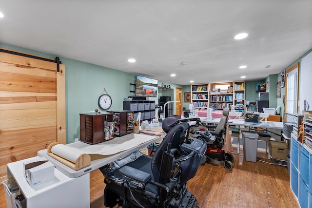 office area with recessed lighting and wood finished floors