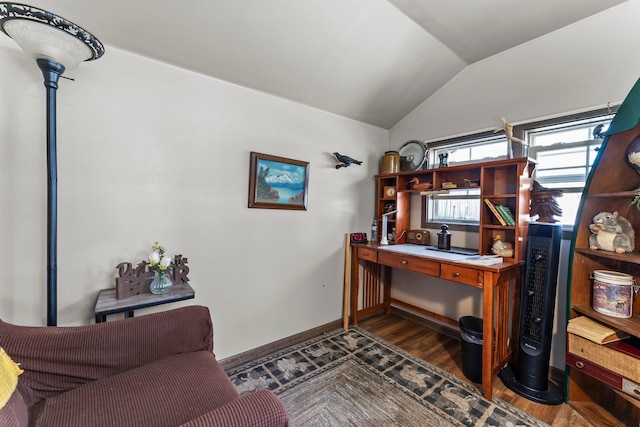 home office with dark wood-style flooring, baseboards, and vaulted ceiling