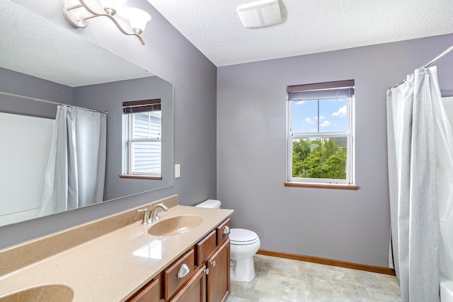 657 Golden Oak St NE, Lonsdale, MN 55046 - bathroom featuring double vanity, a textured ceiling, and a shower with shower curtain