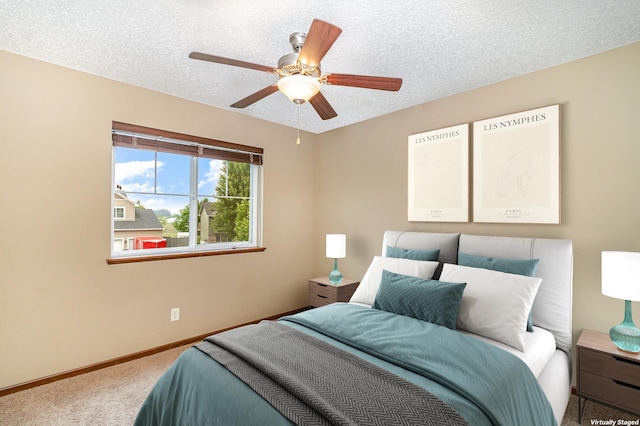 657 Golden Oak St NE, Lonsdale, MN 55046 - carpeted bedroom with a textured ceiling and a ceiling fan