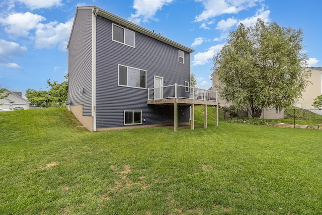 657 Golden Oak St NE, Lonsdale, MN 55046 - back of house with a wooden deck and a yard