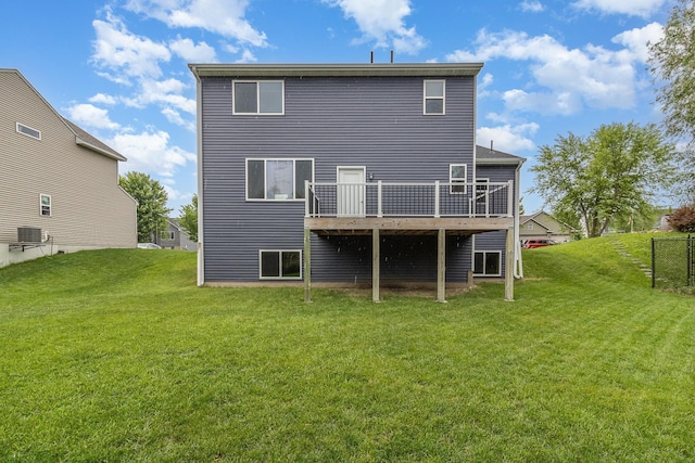 657 Golden Oak St NE, Lonsdale, MN 55046 - rear view of property with a wooden deck and a yard