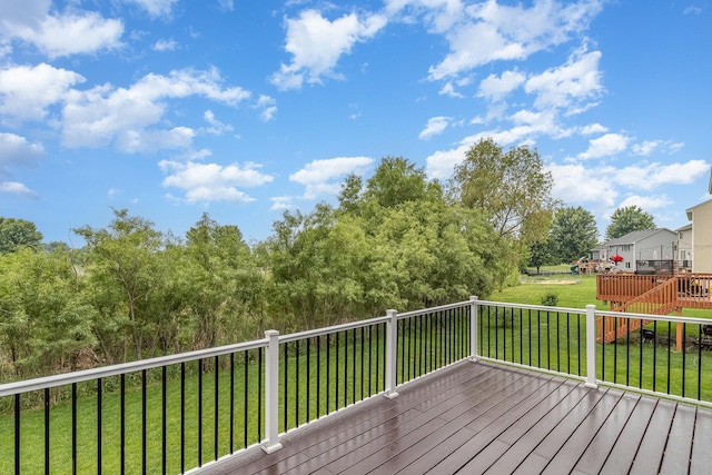 657 Golden Oak St NE, Lonsdale, MN 55046 - wooden deck featuring a lawn