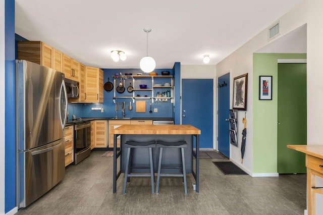 121 Washington Ave S Unit 1508, Minneapolis, MN 55401 - kitchen with appliances with stainless steel finishes, butcher block countertops, a sink, and open shelves