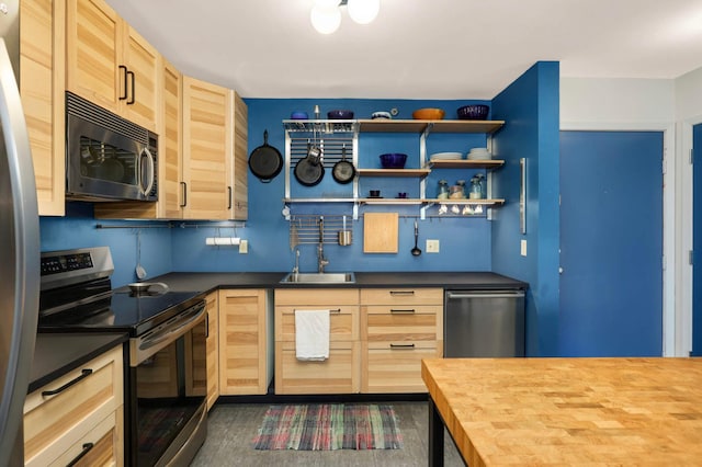 121 Washington Ave S Unit 1508, Minneapolis, MN 55401 - kitchen with appliances with stainless steel finishes, a sink, butcher block countertops, and light brown cabinetry