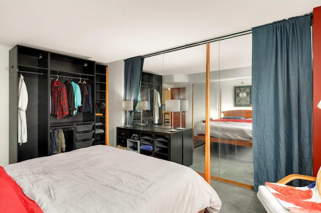 121 Washington Ave S Unit 1508, Minneapolis, MN 55401 - bedroom featuring a closet and finished concrete floors