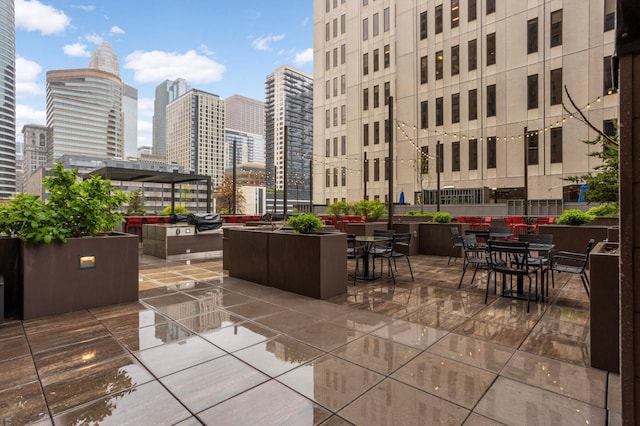 121 Washington Ave S Unit 1508, Minneapolis, MN 55401 - view of patio / terrace with a view of city and a grill