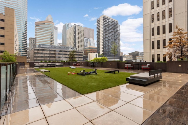 121 Washington Ave S Unit 1508, Minneapolis, MN 55401 - surrounding community featuring a view of skyline and a lawn