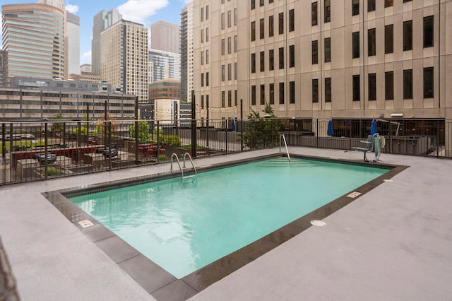 121 Washington Ave S Unit 1508, Minneapolis, MN 55401 - community pool featuring a view of city