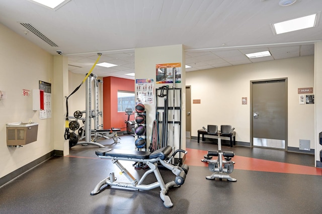 121 Washington Ave S Unit 1508, Minneapolis, MN 55401 - exercise room featuring a drop ceiling and baseboards