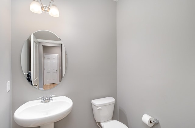 3088 Sunflower Way NW, Prior Lake, MN 55352 - half bathroom featuring a sink and toilet