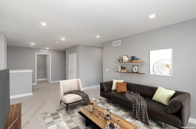 3088 Sunflower Way NW, Prior Lake, MN 55352 - living area featuring light carpet, baseboards, recessed lighting, and a textured ceiling