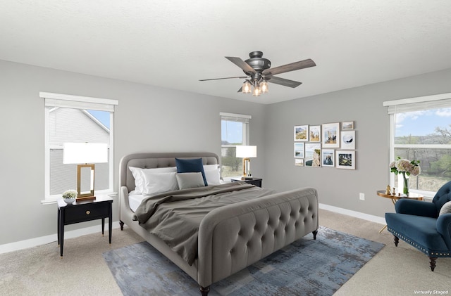 3088 Sunflower Way NW, Prior Lake, MN 55352 - bedroom with light carpet, baseboards, and ceiling fan