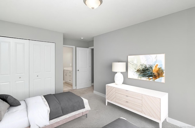 3088 Sunflower Way NW, Prior Lake, MN 55352 - bedroom with a closet, light colored carpet, baseboards, and connected bathroom