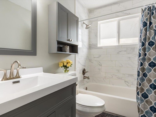 full bath featuring vanity, shower / bath combination with curtain, and toilet
