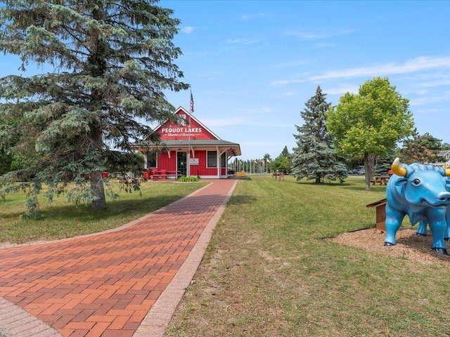 view of front of house with a front lawn and covered porch