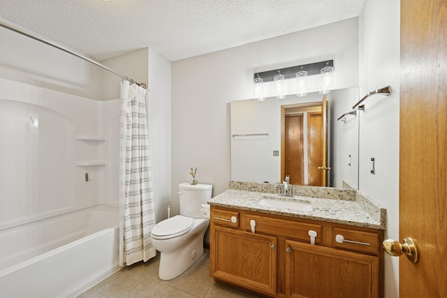bathroom featuring a textured ceiling, tile patterned flooring, vanity, toilet, and shower / bath combo with shower curtain
