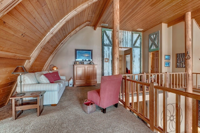 sitting room with lofted ceiling with beams, an upstairs landing, carpet flooring, and wood ceiling