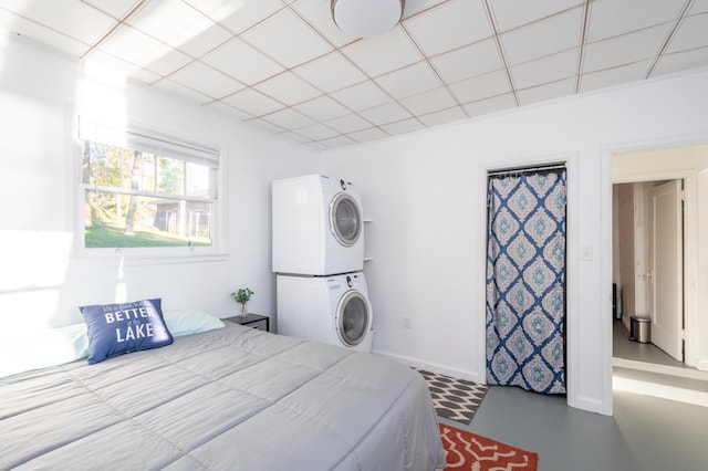 884 White Clover Beach Rd, Detroit Lakes, MN 56501 - bedroom featuring stacked washer and dryer