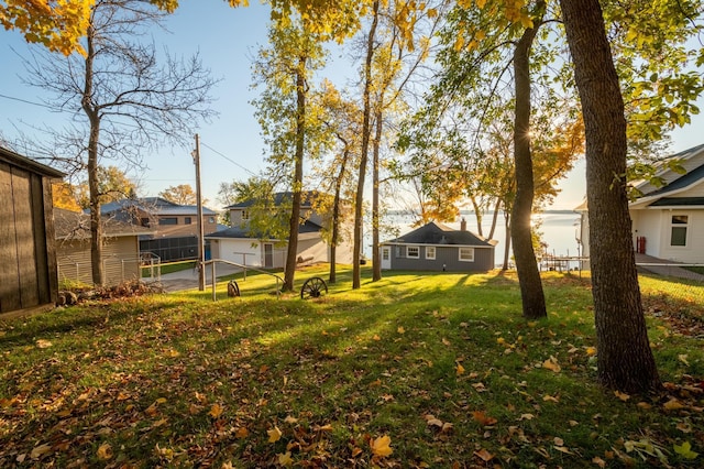 884 White Clover Beach Rd, Detroit Lakes, MN 56501 - view of yard featuring fence and a residential view