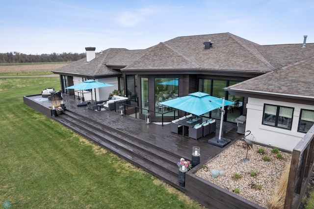 505 Tessa Dr, Moorhead, MN 56560 - rear view of house with a shingled roof, outdoor lounge area, and a deck