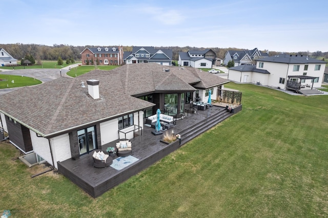 505 Tessa Dr, Moorhead, MN 56560 - rear view of property featuring outdoor lounge area, roof with shingles, a deck, and a residential view