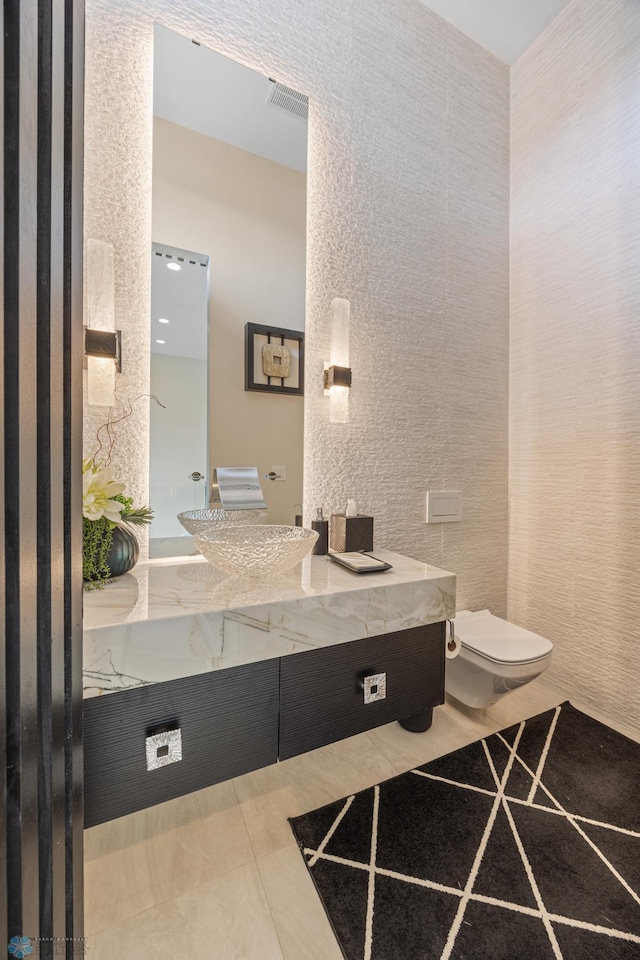 505 Tessa Dr, Moorhead, MN 56560 - bathroom featuring vanity, toilet, and tile patterned flooring