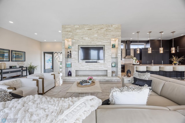 505 Tessa Dr, Moorhead, MN 56560 - living room featuring a stone fireplace and recessed lighting